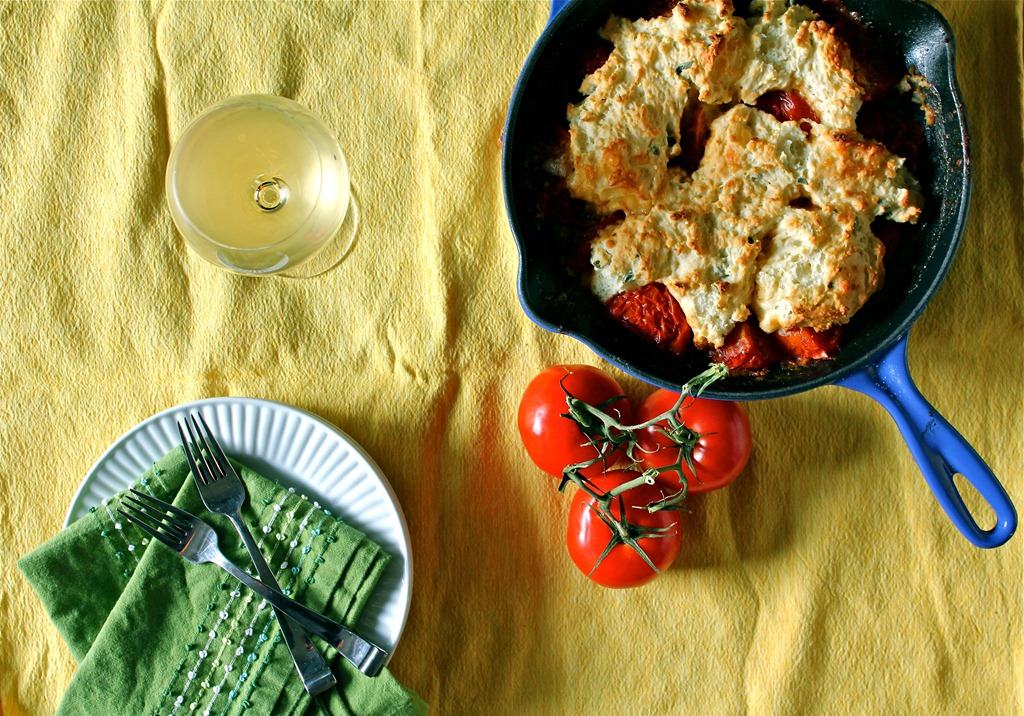 This savory tomato cobbler is the perfect use for all those summer tomatoes. This cobbler is packed full of fresh tomatoes, gouda and fresh sage. You