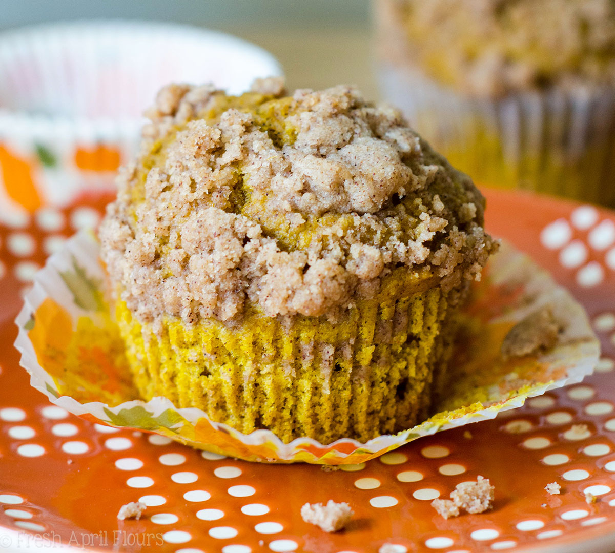 Pumpkin Streusel Muffins: Moist and tender muffins made with real pumpkin and all the warm flavors of fall, topped with an irresistible pumpkin spice streusel.