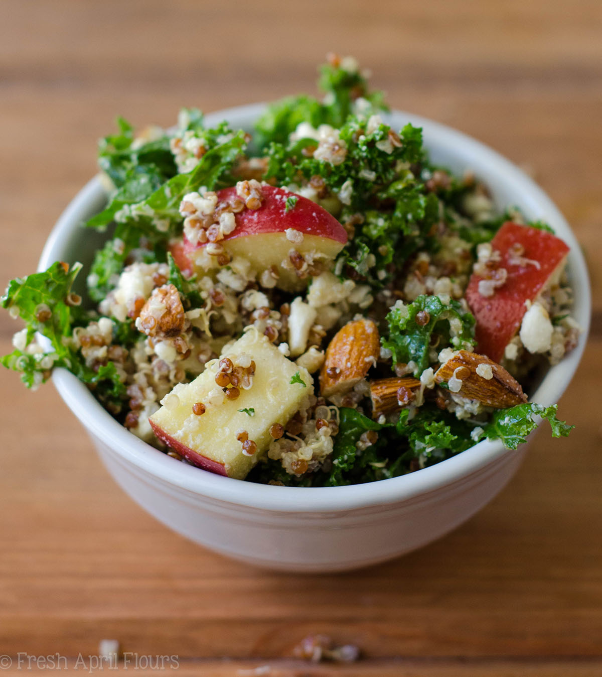 Apple, Quinoa, and Almond Kale Salad: An easy, no bake side dish packed with flavor, fiber, and protein.
