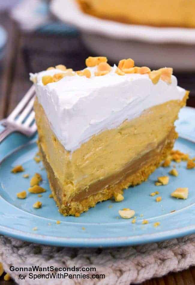 Piece of peanut butter pie on a plate with a fork