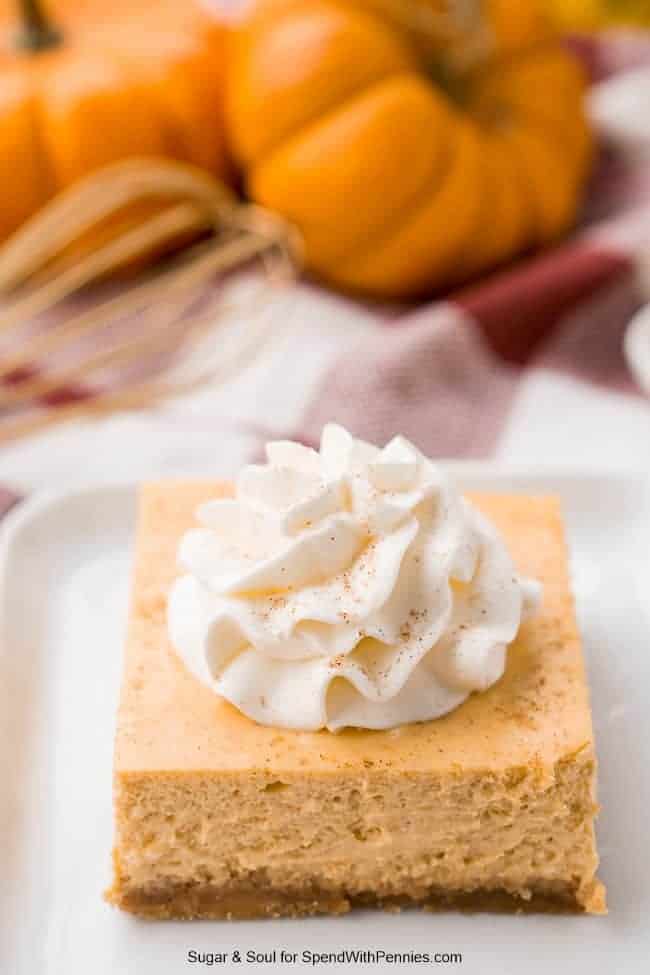 easy pumpkin bar with amaretto cheesecake and whipped cream