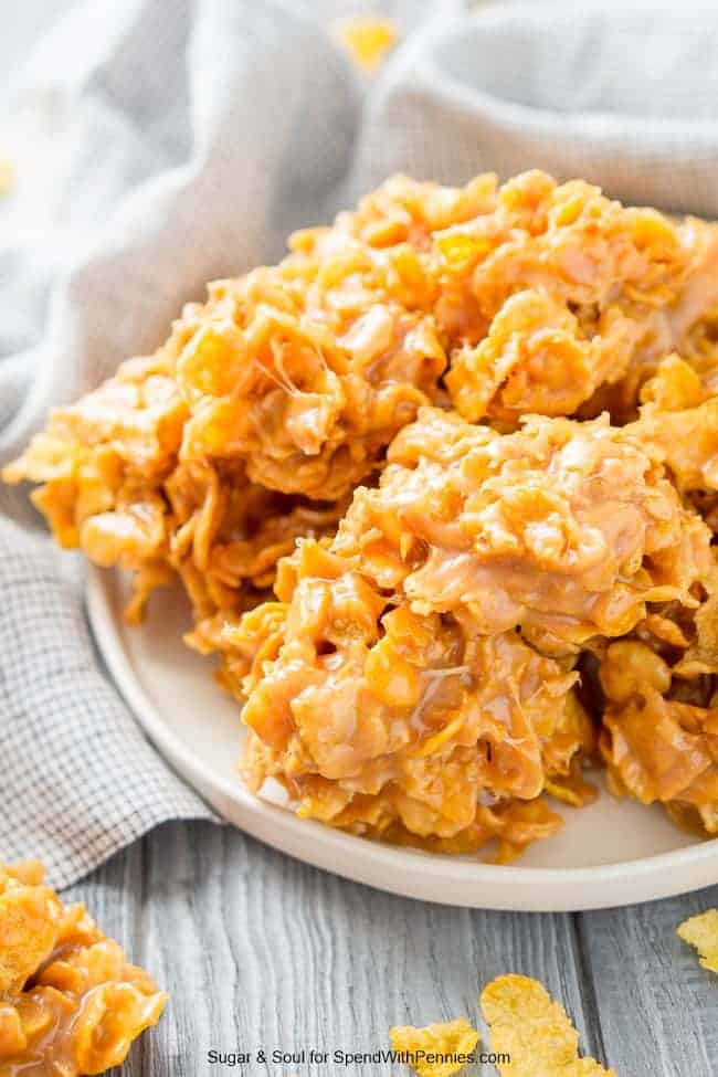 No bake peanut butter cornflake cookies on a white plate