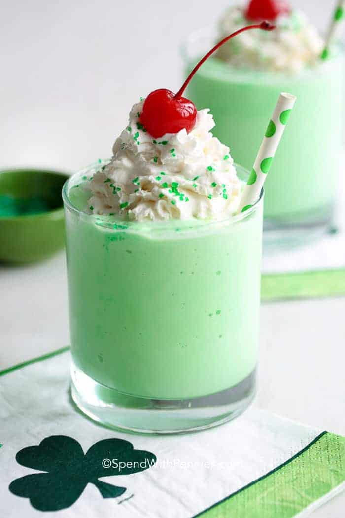 Boozy Shamrock Shake in a glass with a straw