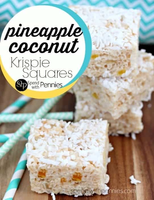pineapple coconut krispie squares on a wood board