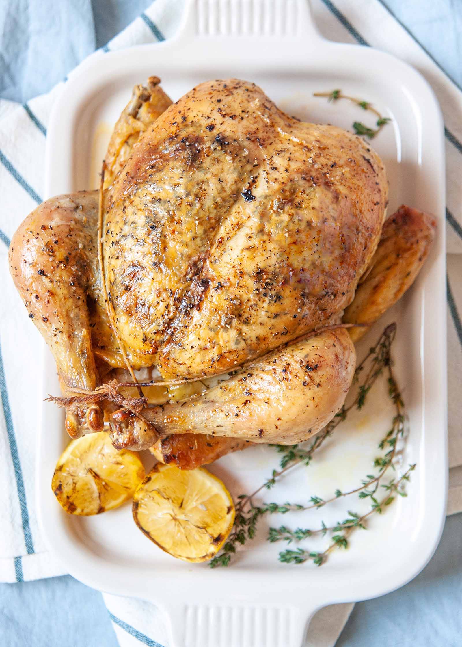 Brined Roast Chicken Recipe - - whole chicken on platter
