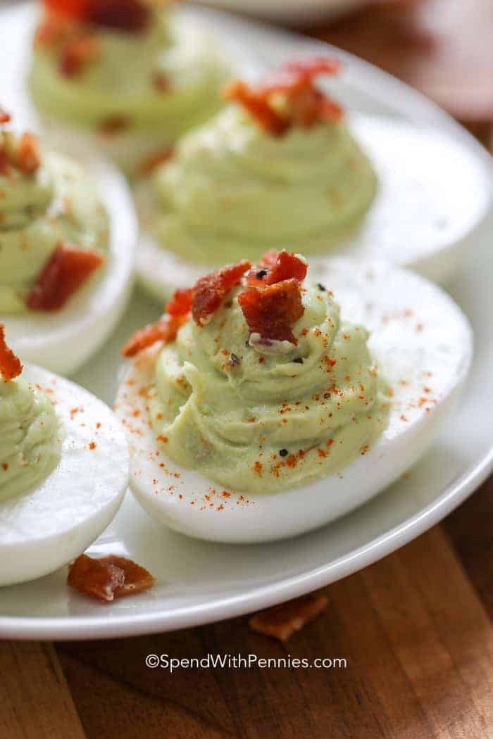 Bacon Avocado Deviled Eggs on a white plate