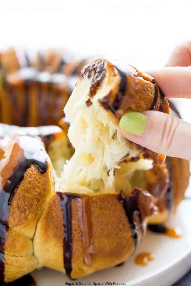 Piece of Rolo pull apart bread in someones hand