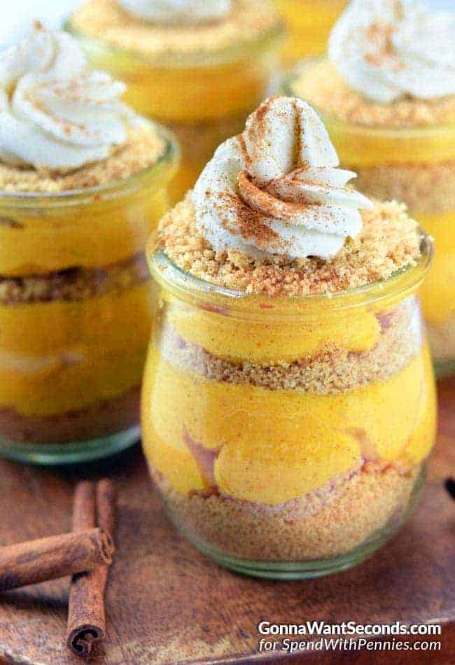 Several glass mugs of Pumpkin Pie Parfaits