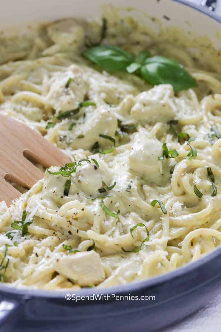 Pesto Pasta in a pot with a wooden fork