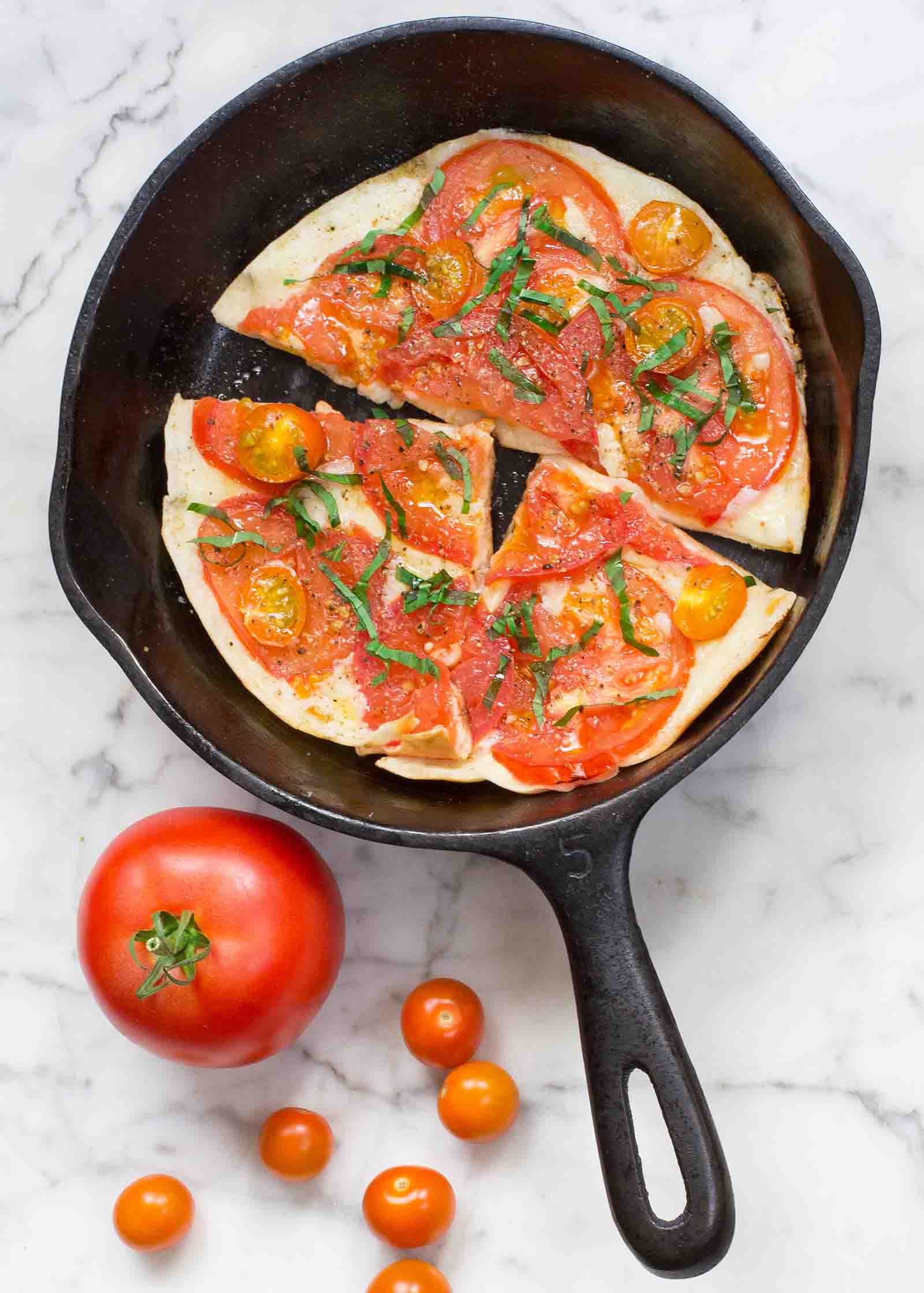 Tomato and Mozzarella Skillet Pita Pizzas