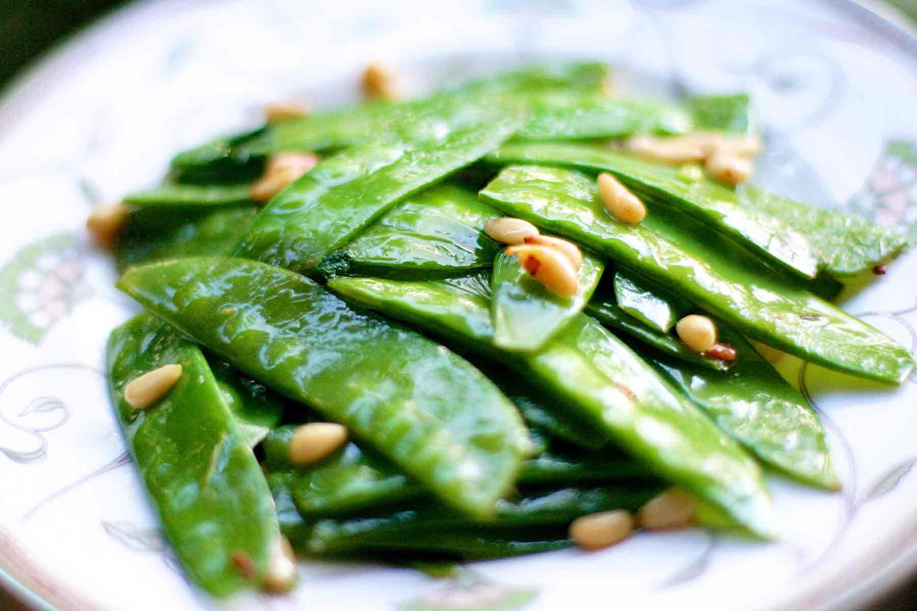 sautéed Snow Peas with pine nuts and mint