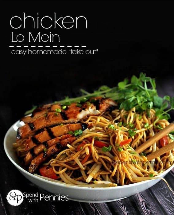 chicken lo mein in a bowl with pea shoots