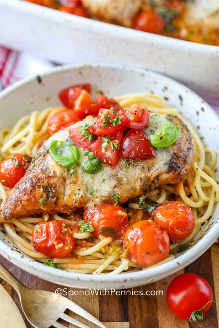 bowl of Bruschetta Baked Chicken with a fork