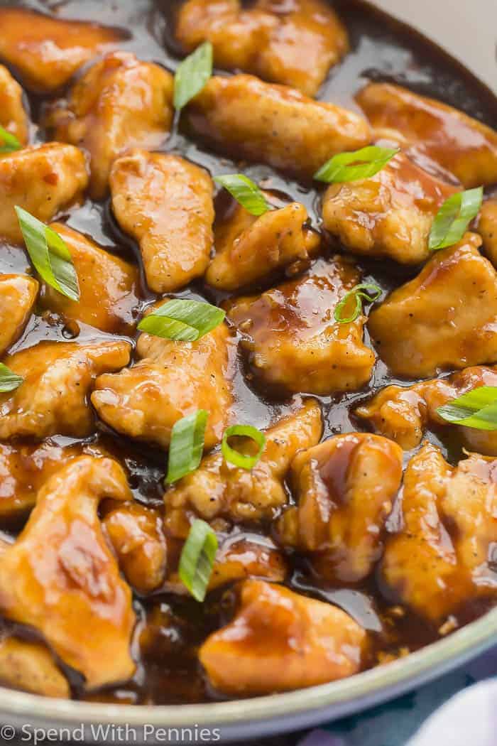 orange chicken close up in pan