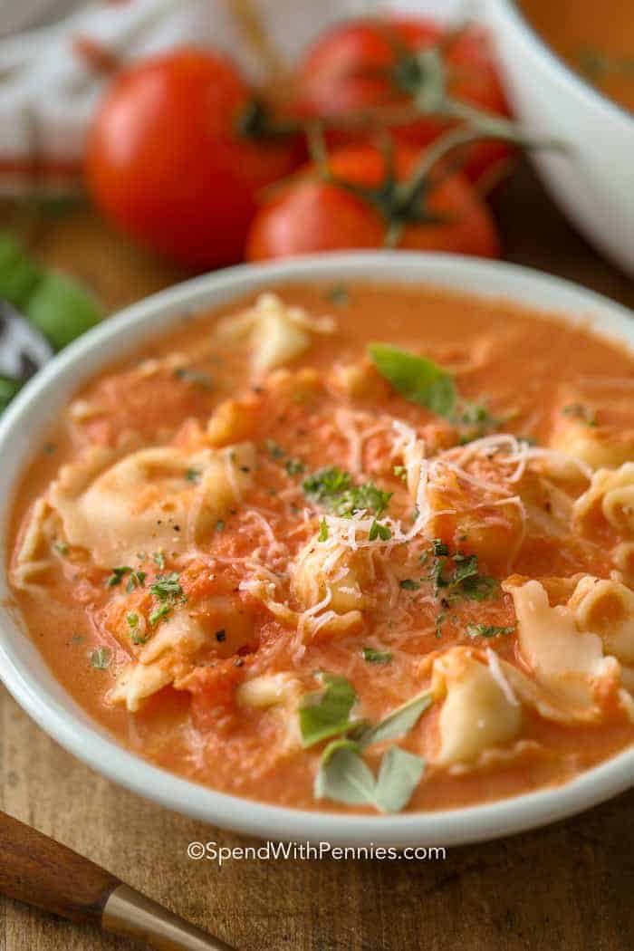 Tomato Tortellini soup in a bowl with herbs