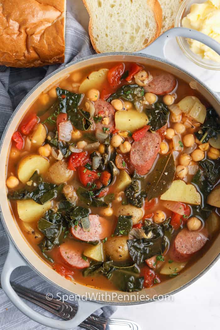 top view of Kale Soup in a pot with bread