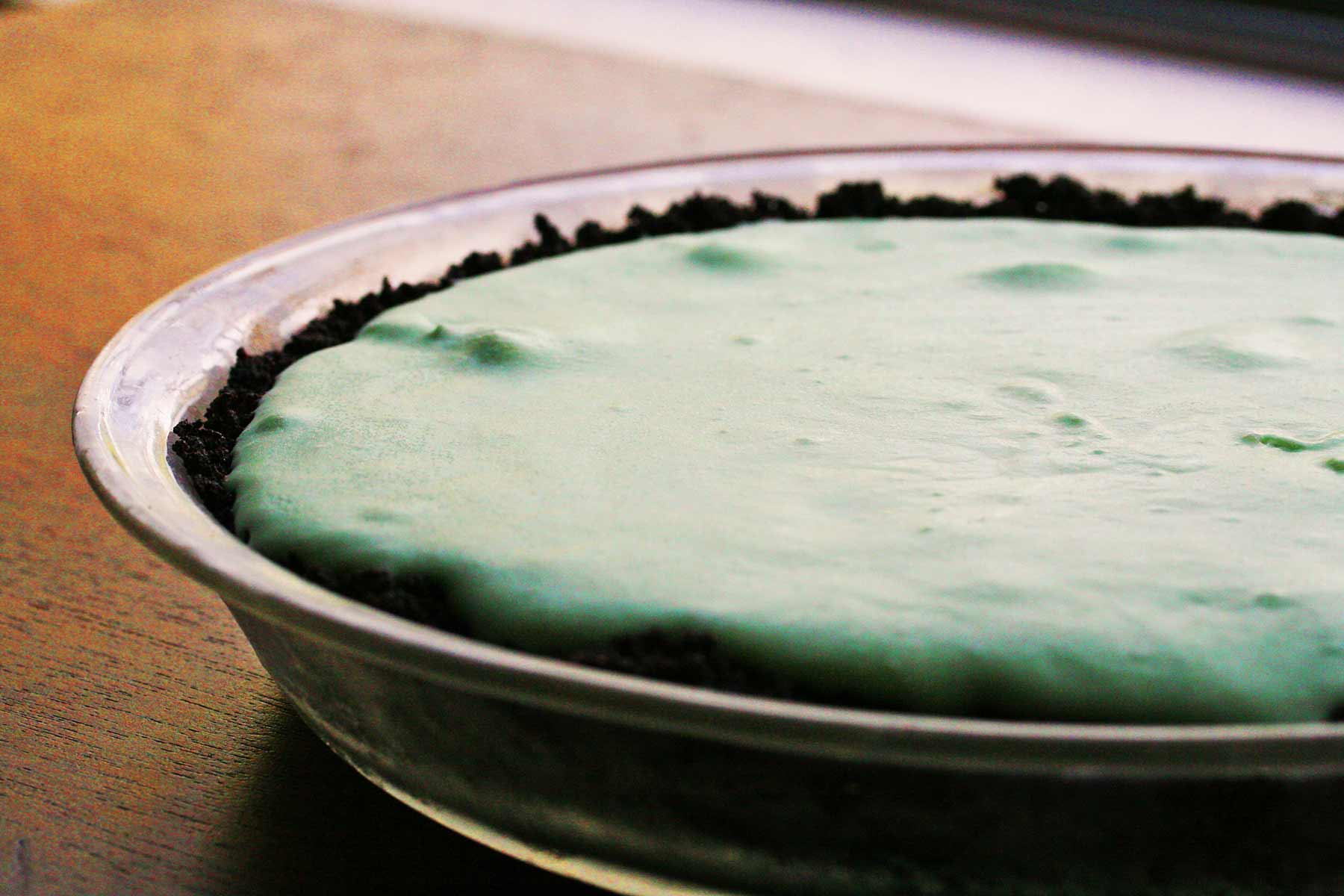 Chilled Grasshopper Pie on Wood Table