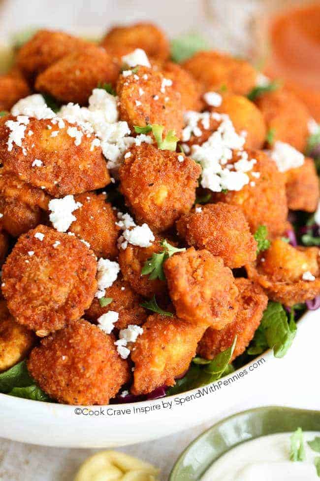 Crispy Buffalo Tortellini with parsley and cheese with dip