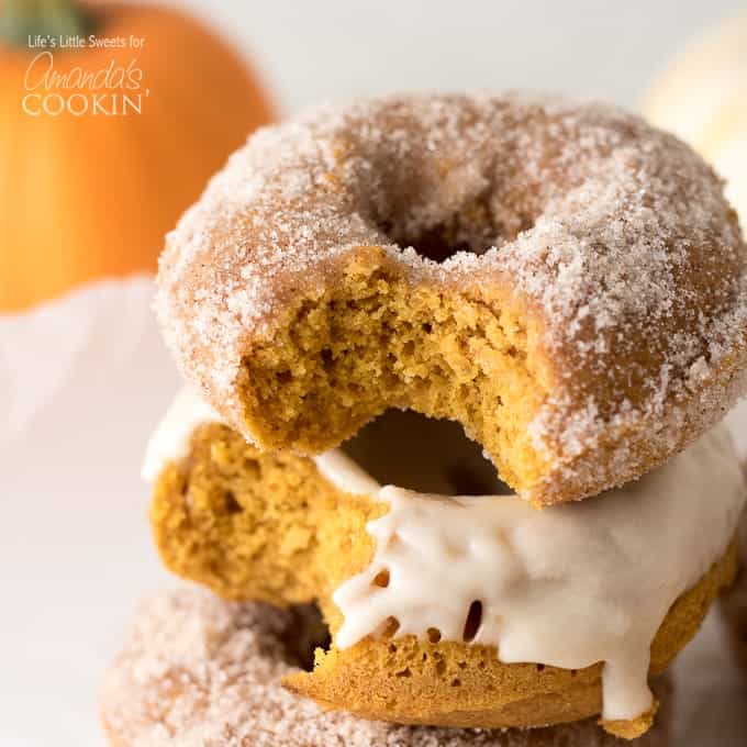 These Pumpkin Spice Donuts are the perfect moist cake donuts that are topped with a pumpkin spice - sugar mixture and/or a maple glaze.