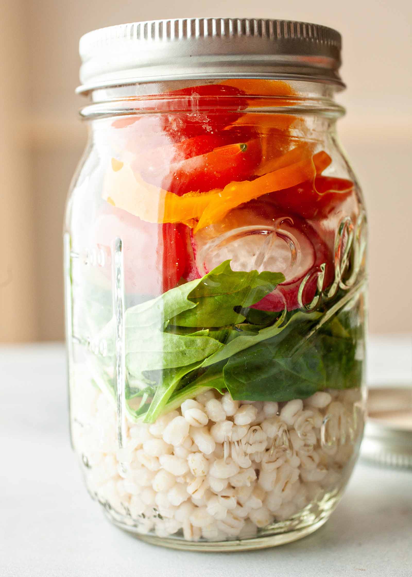 Mason Jar Barley Salad - layered barley and vegetables in mason jar