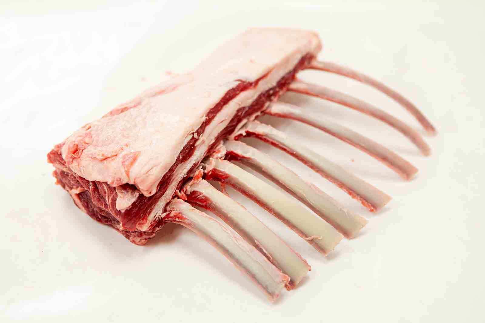 finish cleaning the bones for frenched rack of lamb