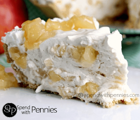 a piece of fluffy pie with apple pie filling shown with writing