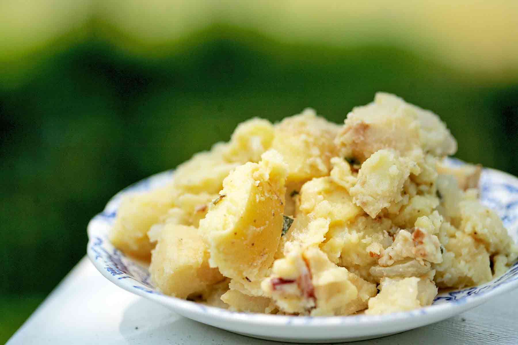 Potato Salad with Apples and Bacon on serving plate