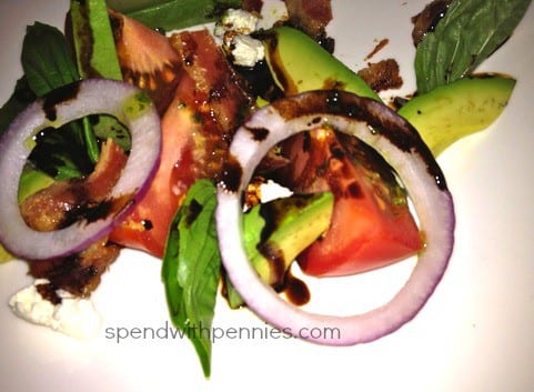 summer salad with onion, tomatoes, basil, avocado and vinegar
