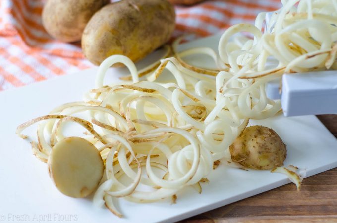 Batatas assadas encaracoladas: Batatas fritas crocantes e saborosas do seu próprio forno. Perfeito como um enfeite ou quando lhe apetecer! Pronto em menos de 15 minutos.