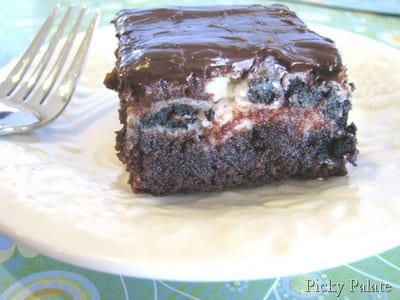 Brownies de biscoitos e creme rodados com manteiga de amendoim e ganache de chocolate