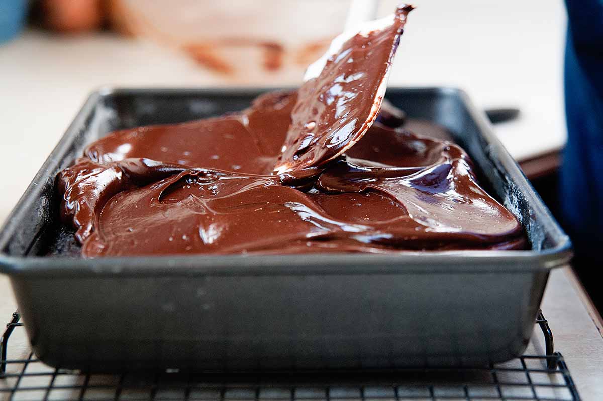 Chocolate Cake with Coffee - spreading the frosting on top