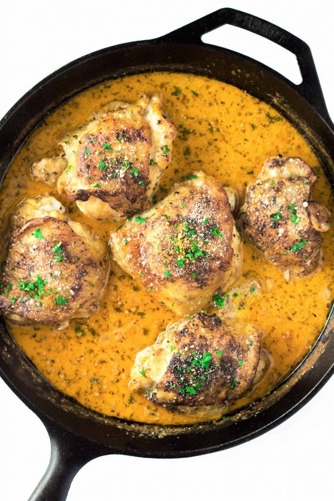 Lemon butter chicken thighs seared to perfection and finished in the oven in a finger-licking good garlic parmesan cream sauce. 