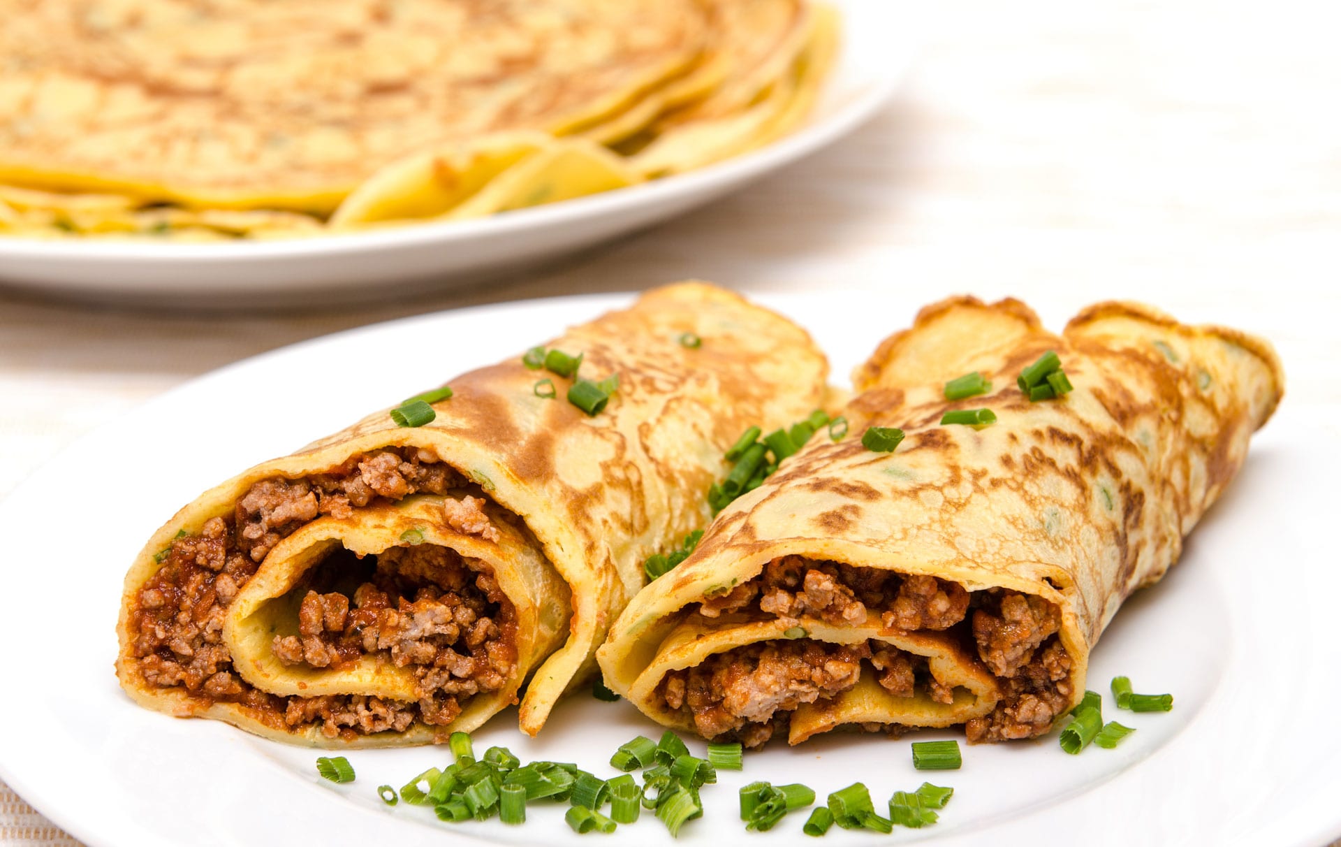 Panquecas de carne e rábano Estes rolos de panqueca de carne e rábano são fáceis de fazer e são um fast food no meio da semana que as crianças vão adorar, especialmente carne macia.