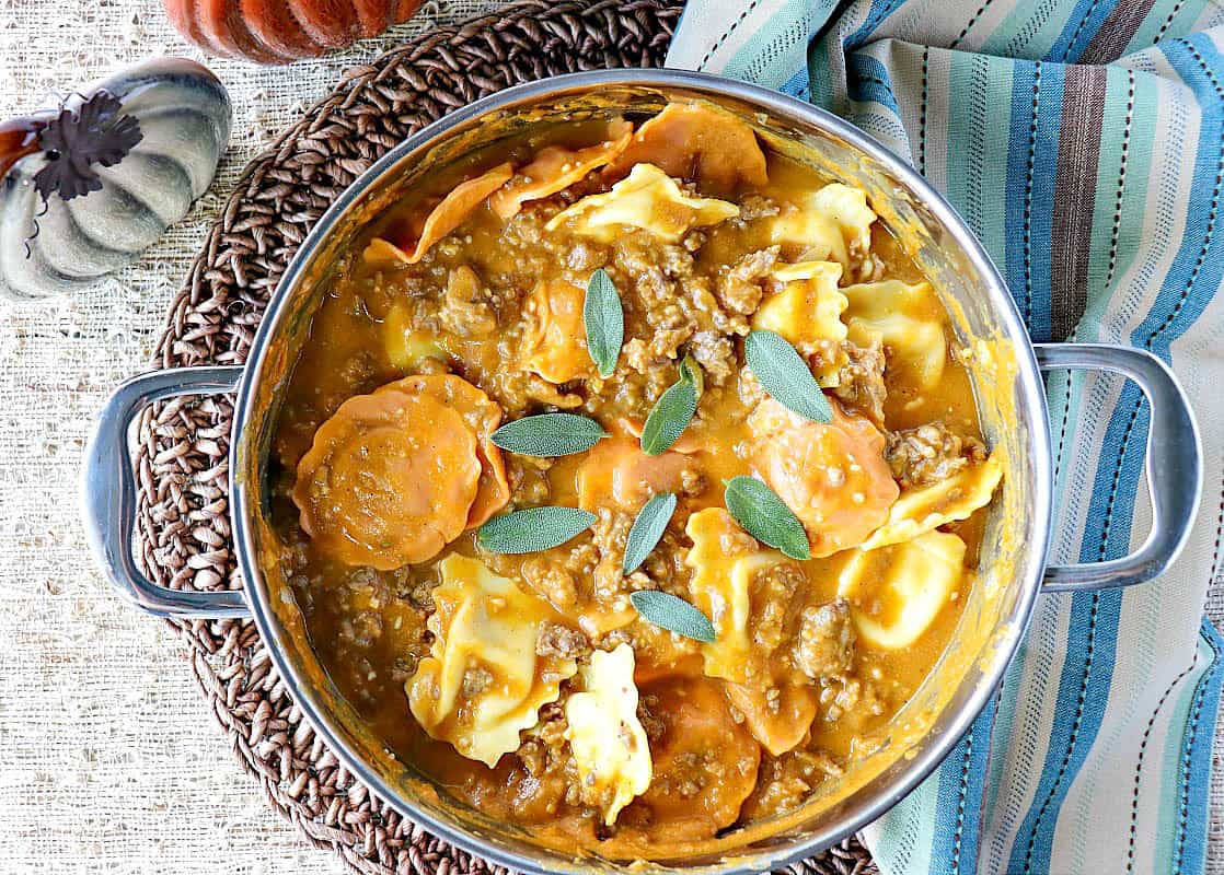 Easy Ravioli with Pumpkin Sausage Vodka Sauce is a proof positive that serving pumpkin for dinner is always a winner! - kudoskitchenby.com