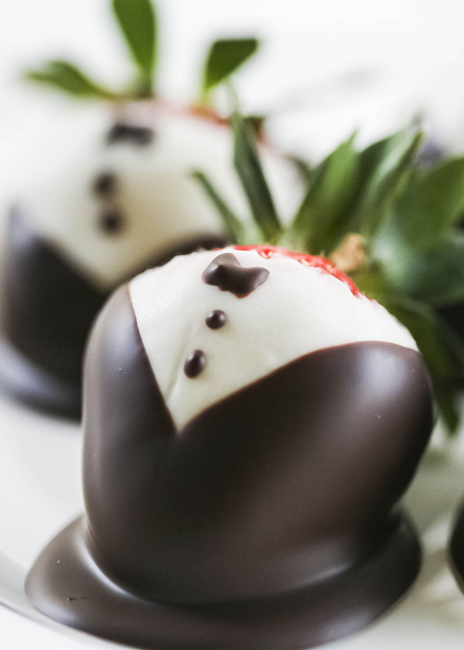 Finished chocolate covered strawberries on a plate ready to be served