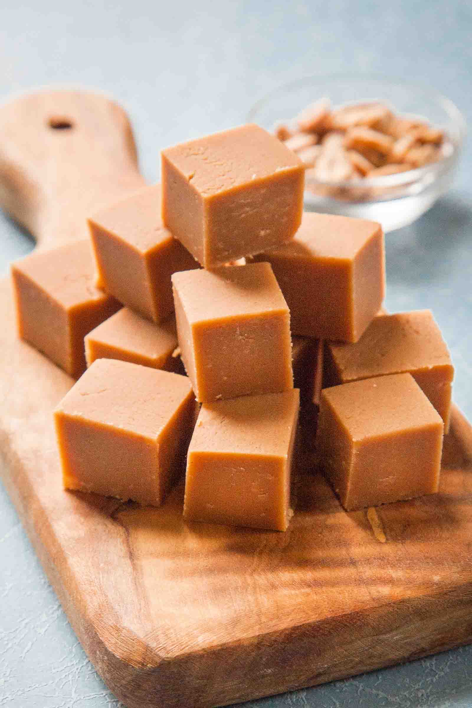 Easy Peanut Butter Fudge on a wooden serving platter