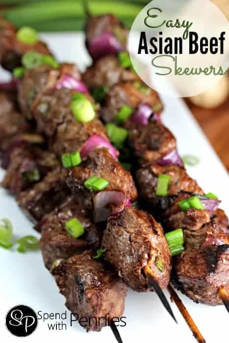 Asian Beef Skewers garnished with green onion