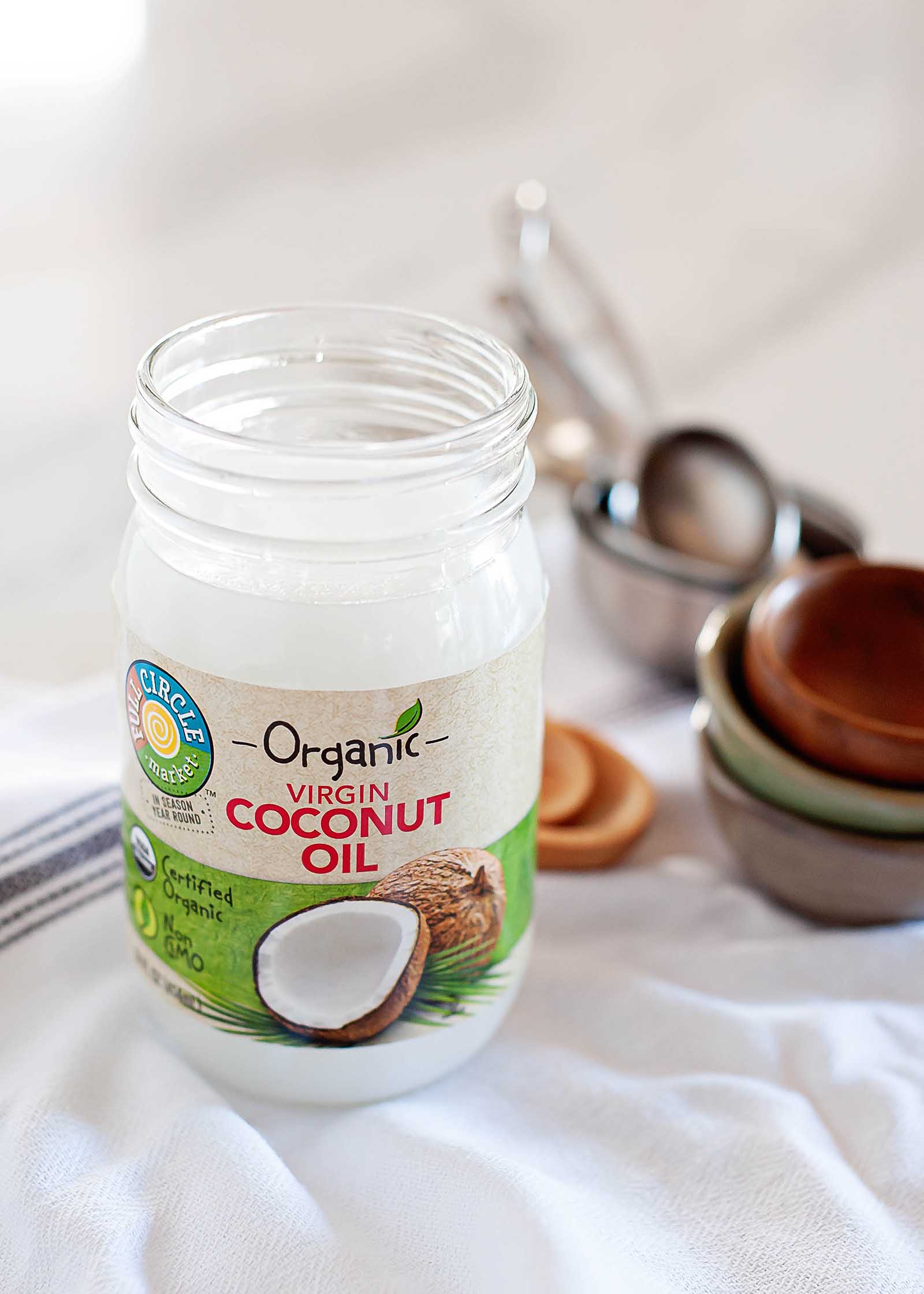 Jar of solid virgin coconut oil