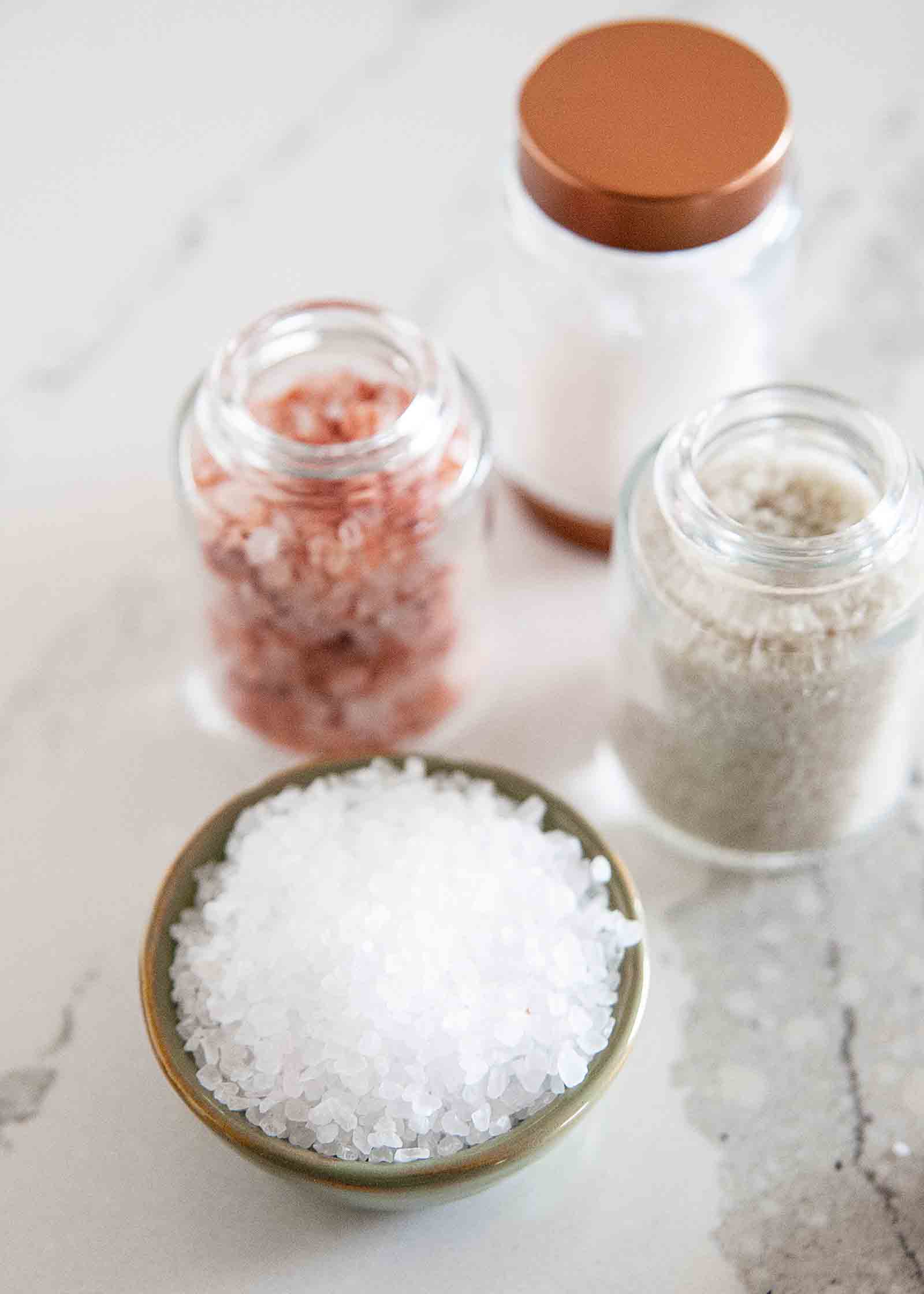 1 jar pink Himalyan rock salt, 1 jar sel de gris, one bowl of Maldon sea salt