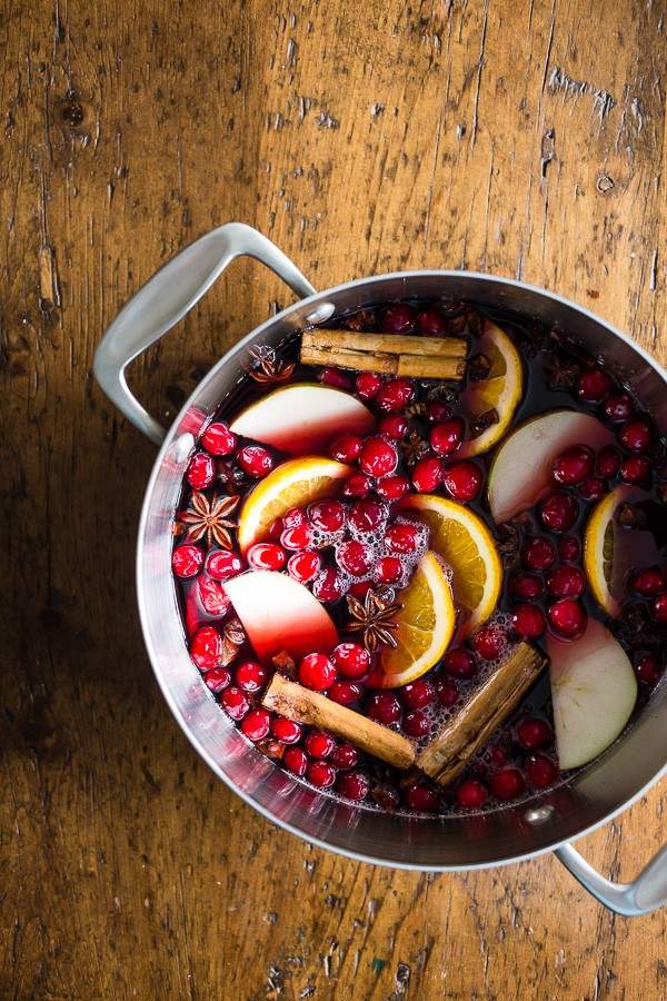 This holiday spiced mulled wine is just what your holiday party needs! Full of red wine, apple cider, whole spices and lots of fresh fruit. You
