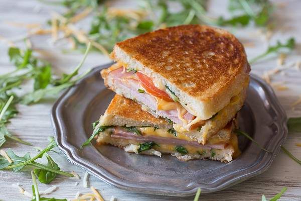 This totally cheesy Canadian BLT Grilled Cheese is stuffed with cheese, arugula, tomato and Canadian bacon. It