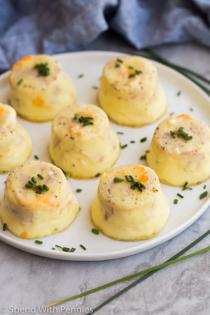 instant pot egg bites on a white plate with chopped chives