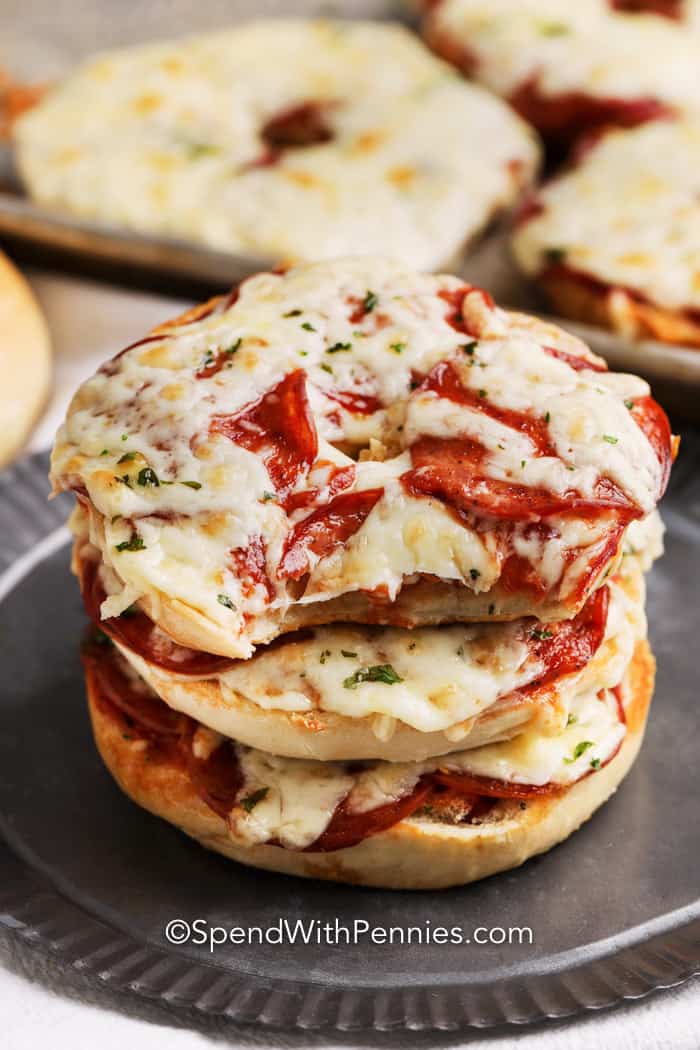 stacked pizza bagels on a plate