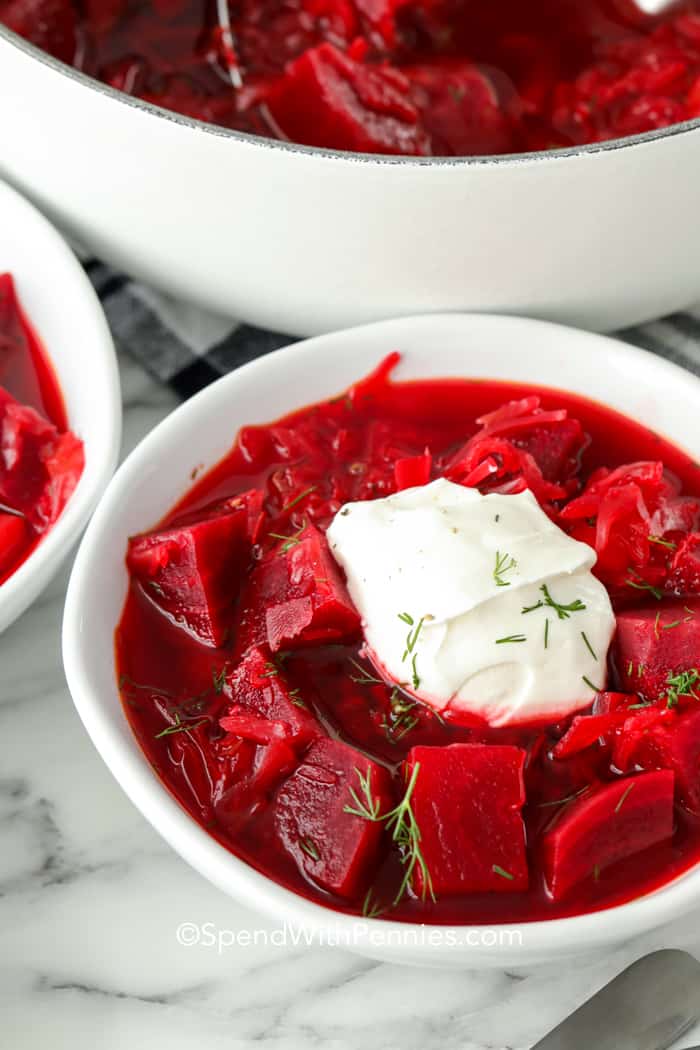 a serving of Hot Borscht in a bowl with sour cream