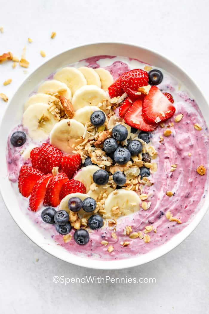 overhead of Berry Banana Smoothie Bowl with strawberries, blueberries and bananas