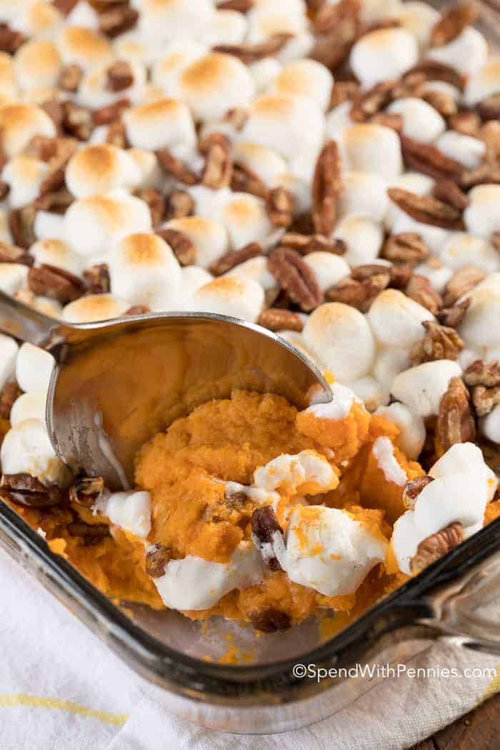 Sweet Potato Casserole being served with spoon