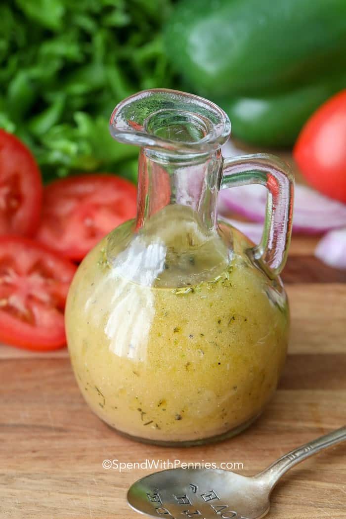 Italian Dressing in a jar with a spoon