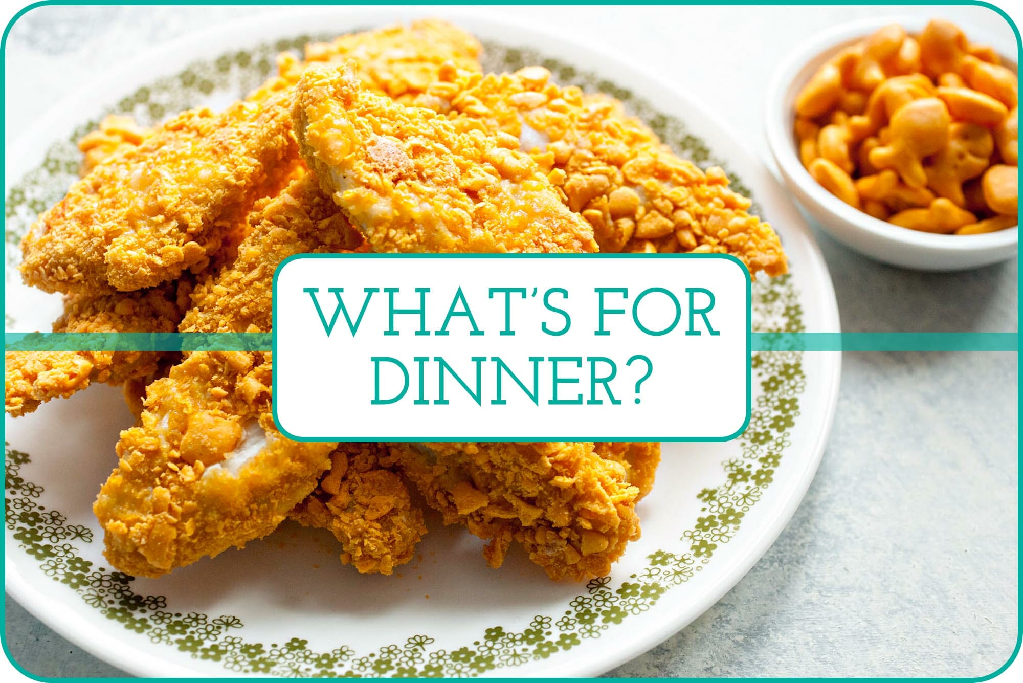 "What's For Dinner" with Goldfish Chicken Tenders on a plate and set behind the caption.
