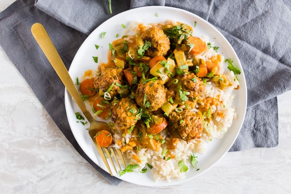 These red curry turkey meatballs are packed full of flavor and come together in no time for a quick weeknight meal. You can even make the meatballs in advance to make the meal come together even quicker! 