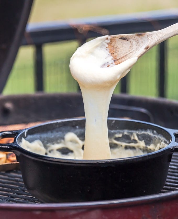 Easy Cheese Fondue with Grilled Bread is such a fun, quick, and EASY appetizer to make on the grill this Summer! There